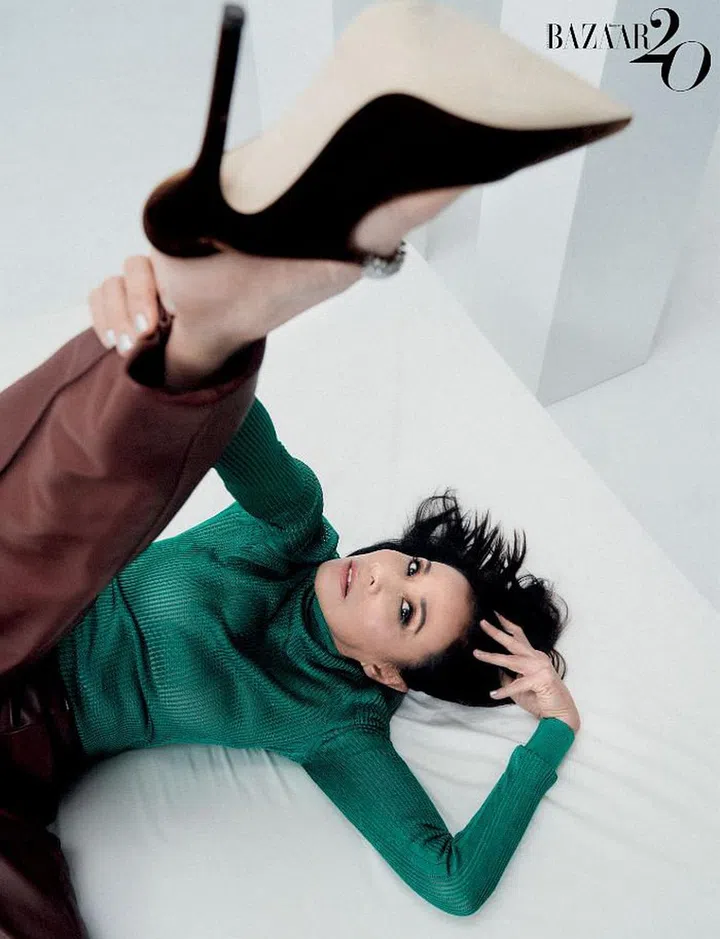 Top; trousers, Hermès. Shoe, Jimmy Choo.