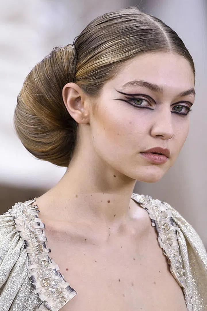 Hadid rocks a hair roll at the Chanel spring 2016 couture runway show. Photo: Getty