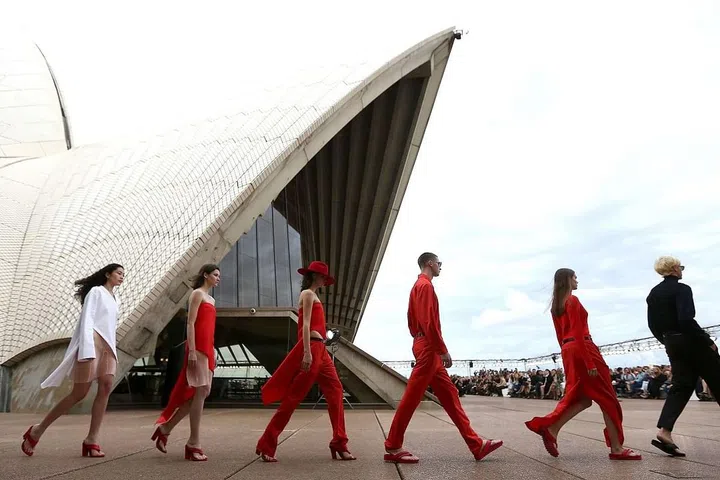 Nestled between the iconic sails of one of the world’s most recognizable buildings, the Dion Lee show kick-started the week with a sleek, urbanite women’s collection and the debut of a swim and menswear line. “The Sydney Opera House is something I’ve consistently looked to for creative inspiration, drawing synergies between its architecture and the sculptural nature of my collections,” the designer explains. Photo: Getty 