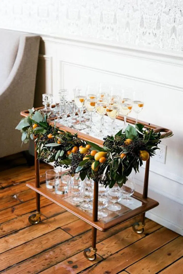 Your spirits will taste that much better getting shaken up atop a festive bar cart.