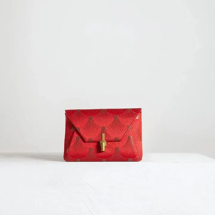 Torres Mandarin Red, $450, Ling Wu