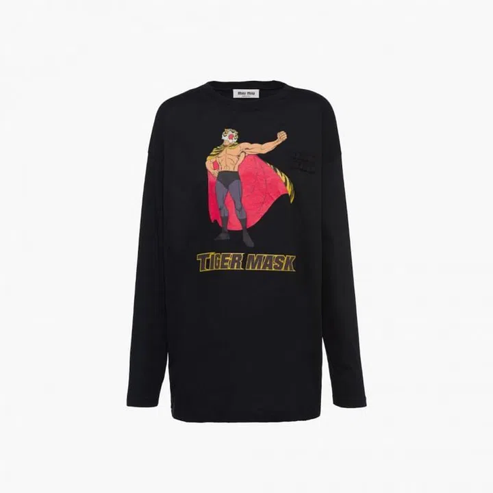 Cotton T-shirt, $1,200, Miu Miu

