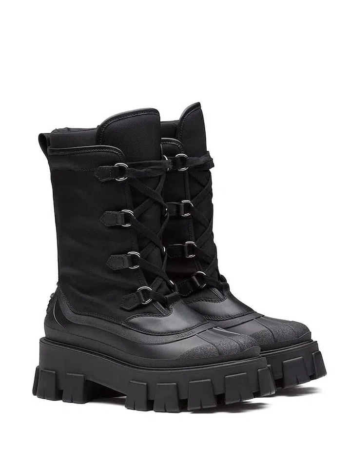 Monolith 55mm Combat Boots, $2,270, Prada at Farfetch