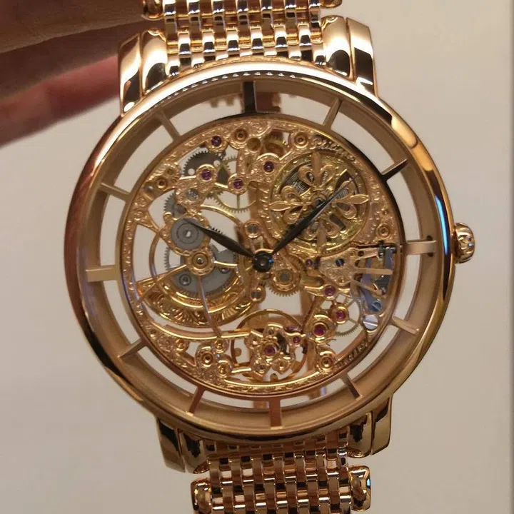 This breathtaking skeletonised timepiece (ref 5180/1R-001) requires over 130 hours of engraving. It features blackened hands for greater legibility