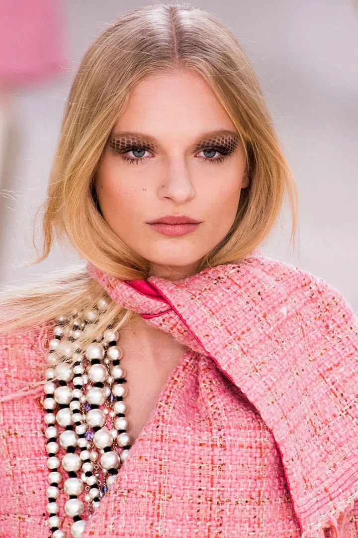 What do quilted handbags, gravitational waves and '60s pop art all have in common? Nothing, minus the fact that they all inspired the makeup at some of the biggest shows. At Chanel (left), Tom Pecheux reinvented the classic smoky eye with a netted pattern that paid homage to the brand's iconic bags; Peter Philips translated Einstein's theory into psychedelic swirls made for the festival scene at Fendi; and elsewhere, graphic lines that went outside the traditional lines were all the rage. Photo: Imaxtree
