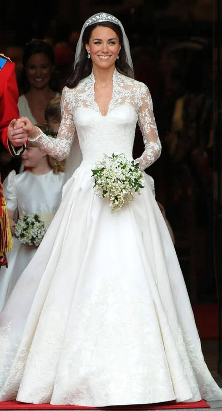 On her wedding day, the Duchess complemented her Alexander McQueen bridal gown with a dramatic veil, which was anchored by the Cartier Halo Scroll Tiara, on loan from Queen Elizabeth.
