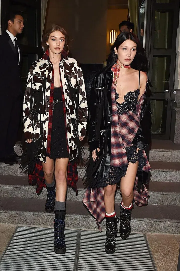 Leaving their hotel together during Milan Fashion Week. Photo: Getty 