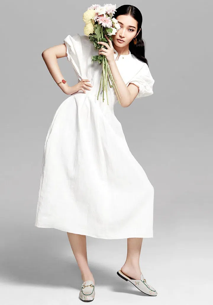 There's something special with the choice of fabrics that Phoebe Philo used for Céline. This dress comes in with a certain stiffness, marrying tough and chic elements that Philo always tackles in her designs. 