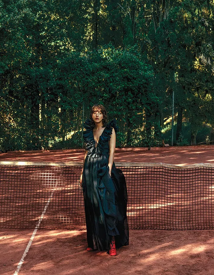 Lace dress, Dior. Snakeskin boots, Givenchy