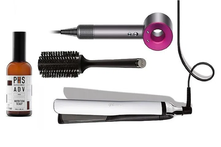 An assortment of hair essentials from PHS Hair Science, GHD and Dyson. 