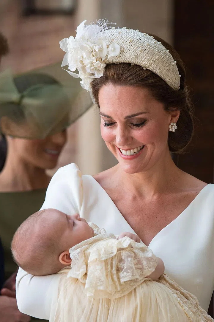 Kate was beaming on her youngest child's big day.

