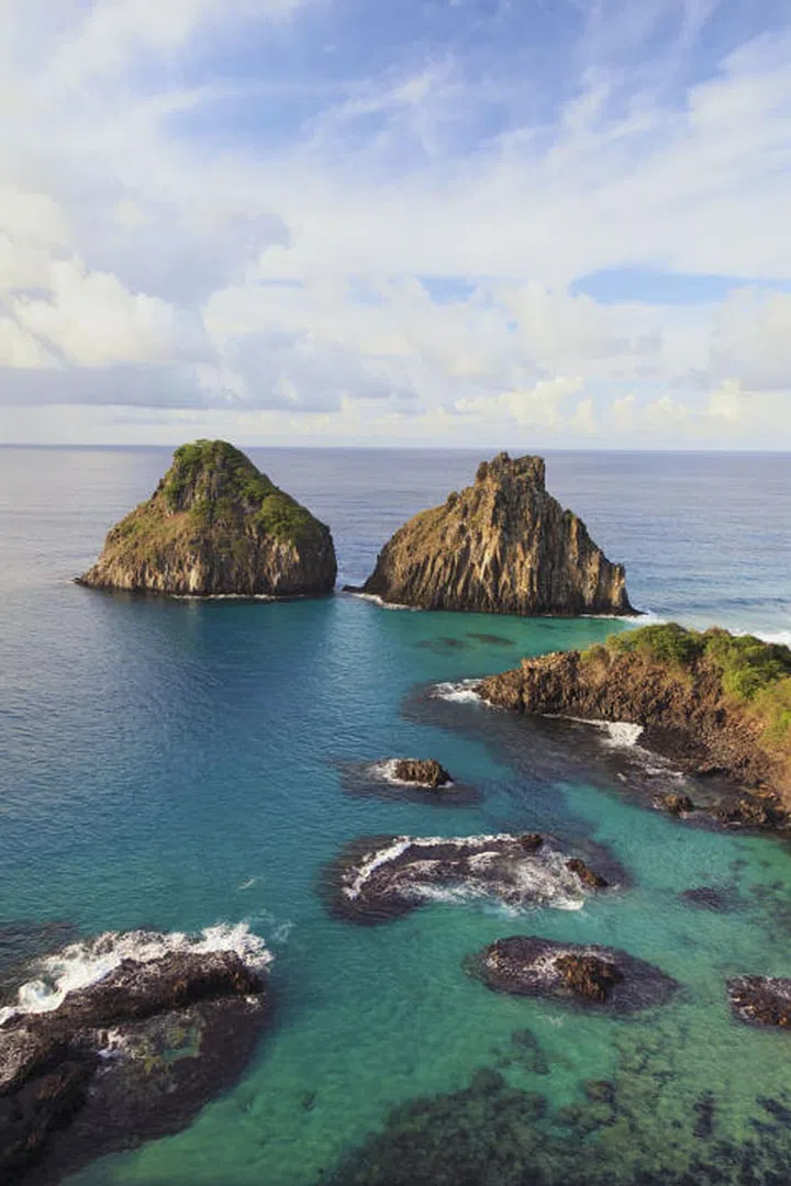 Since the Fernando de Noronha archipelago is located 200 miles off Brazil's coast, you'll feel like you're on a deserted island with miles of white sand beaches all to yourself. Trust us, it's totally worth the effort to get there.