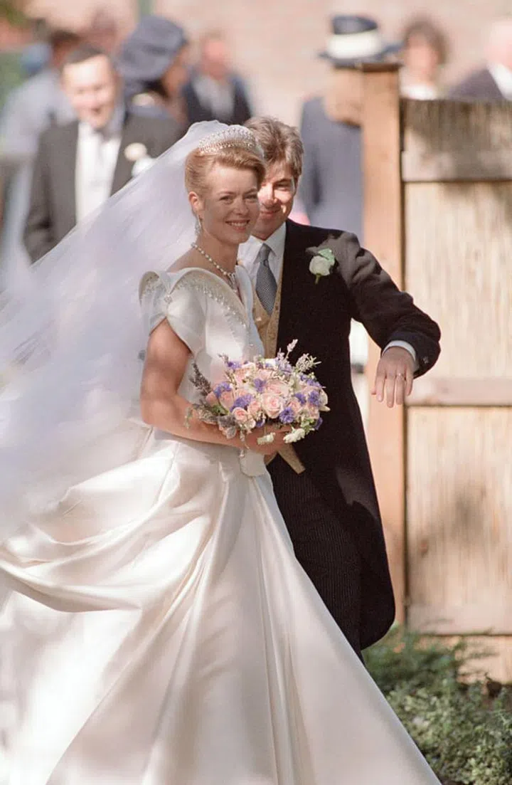 Taylor, the daughter of the Duke and Duchess of Kent, chose the Kent Diamond and Pearl Fringe Tiara for her wedding day. Her mother Katharine also wore the gorgeous tiara to her wedding. That tiara is believe to be a modified version of a bandeau tiara that once belonged to Queen Mary, the Order of Splendor reports.