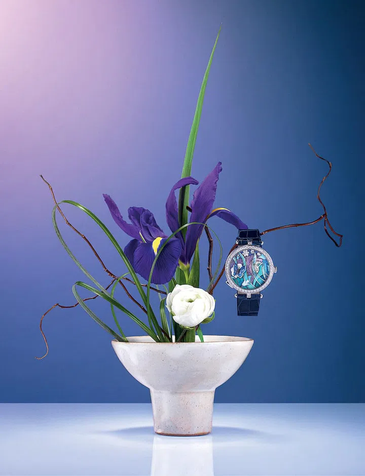 White gold, sapphire, mother-of-pearl and diamond Lady Arpels Papillon Automate watch, by Van Cleef & Arpels.(Photo: Hosanna Swee)