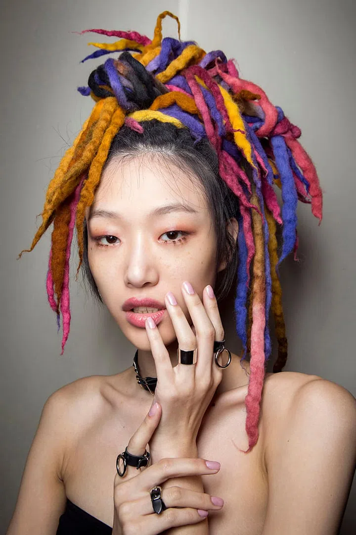 THE INSPIRATION: Marc Jacobs Spring/Summer '17.
WHY WE LOVE IT: When cream and pearlescent neutrals are glossed over almond and oval-shaped nails there's an instant lengthening effect that leaves fingers looking soft and feminine. Natural hues appear classic when worn alone, but also make the perfect base for simple nail art in the form of pale stripes and white swipes.
