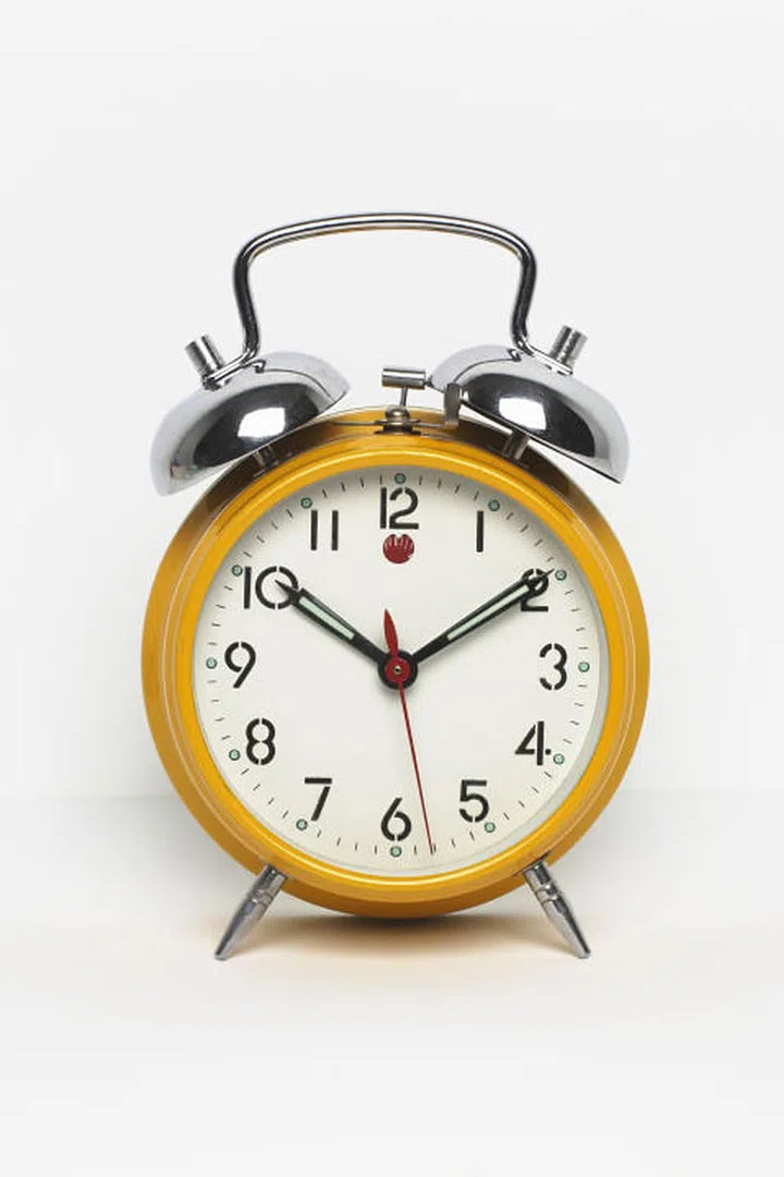 "The best way to start getting to bed earlier is to start getting up earlier every day of the week. Set your alarm for something reasonable—don't plan to shift from getting up at 8:30 a.m. to getting up at 5:00 a.m. all at once. Try setting your alarm 30 minutes earlier for a week before moving it earlier again. No snoozing allowed. Once your body adjusts to waking earlier, you will naturally become sleepy earlier at night."

Maintaining this sleep schedule despite the ebbs and flows of your weekend plans (AKA drinking) might seem like a big ask, but the National Sleep Foundation recommends that you stick to it to keep your body clock on track. Photo: Getty
