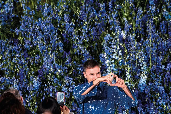 Premonition or not? An online article posits that Raf Simons makes this gesture at the final shows of his tenure at different brands. 
