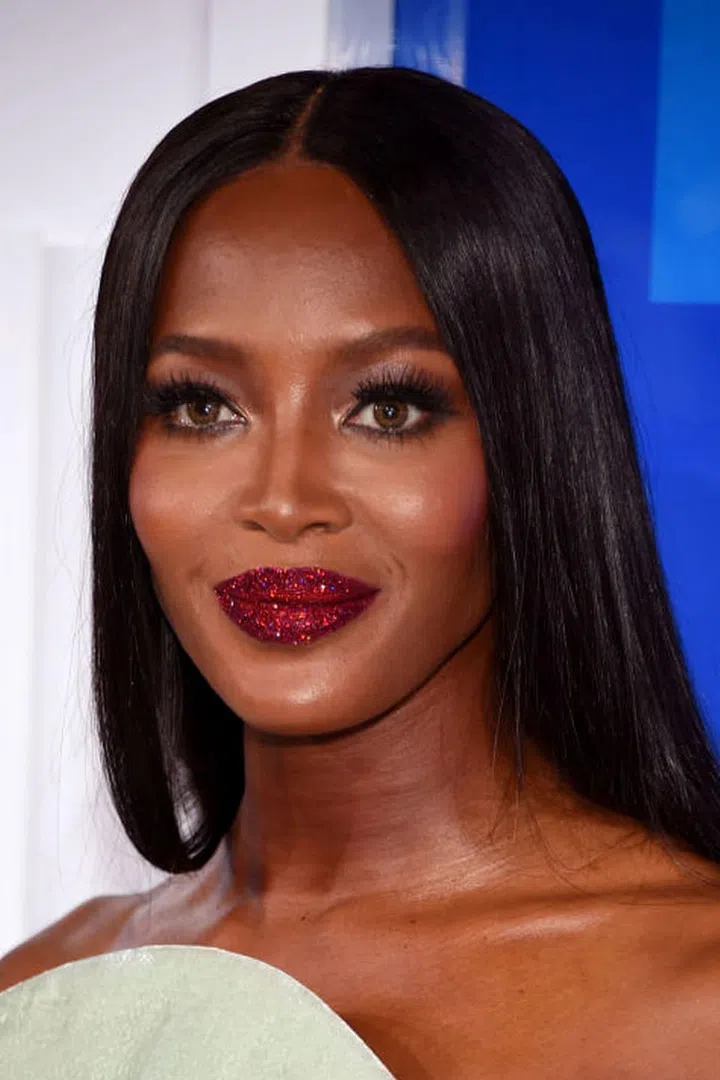 Is that Pat McGrath's Lust 004 glitter lip we spy? Why yes, yes it is.