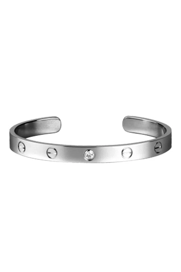 Cartier's love bracelet is a timeless jewellery staple that every woman should have in their jewellery collection. We love this one with a subtle diamond detail.