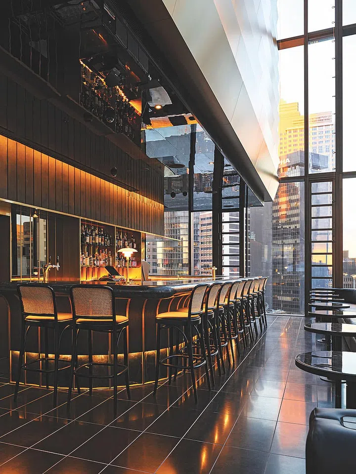 Wining and dining at Dean & Nancy on 22 comes with a side of sparkling city views. Photo: A by Adina Sydney)