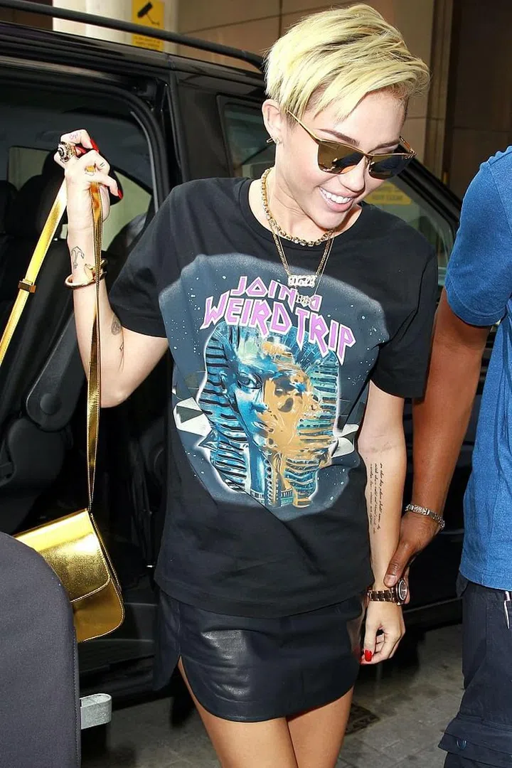 Cyrus has 23 tattoos, from tiny, simple pieces (an Om symbol on her left wrist, an egual sign in support of gay marriage on her finger) to large tributes (she has a portrait of her grandmother on her right arm, while her most recent tat is an image of her deceased dog, Floyd).