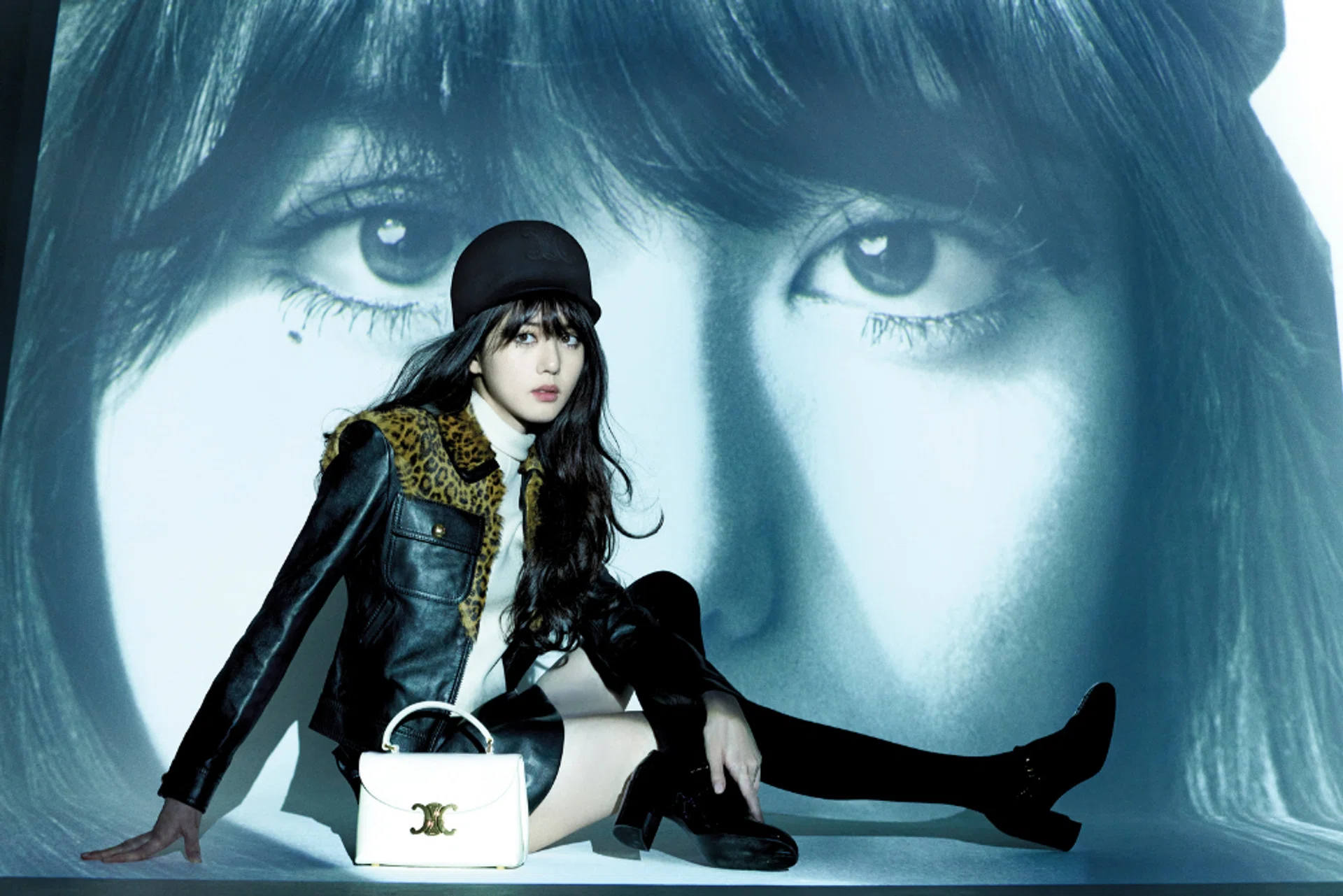 Blouson; top; Trapeze miniskirt; Triomphe cap; Teen Nino bag; CELINE Lily Triomphe Babies pumps, CELINE BY HEDI SLIMANE.