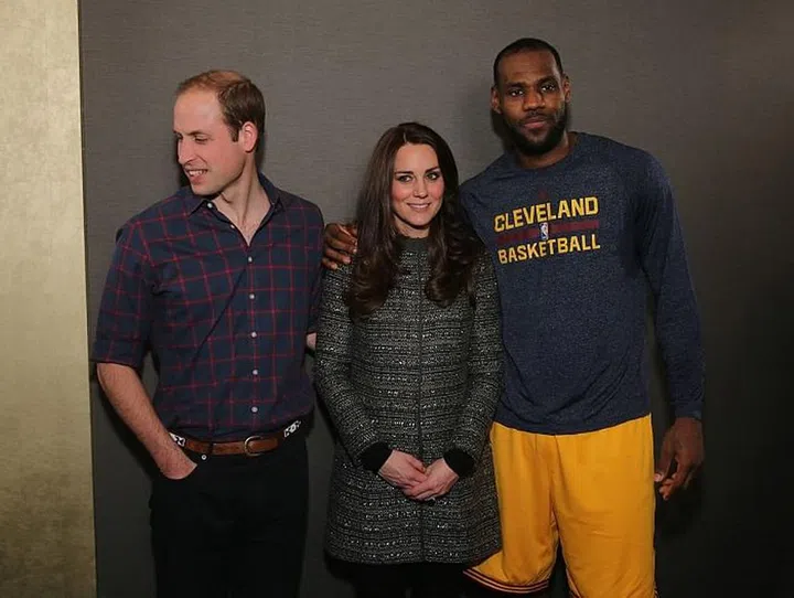 Forget that he's clearly breaching protocol with the cosy hug - those sweat patches should not be touching that expensive dry-clean only coat... Photo: Getty 