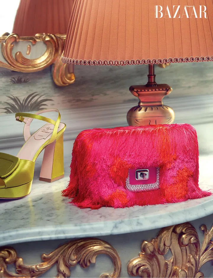 Platform sandal; Viv’ Choc strass buckle bag, Roger Vivier.