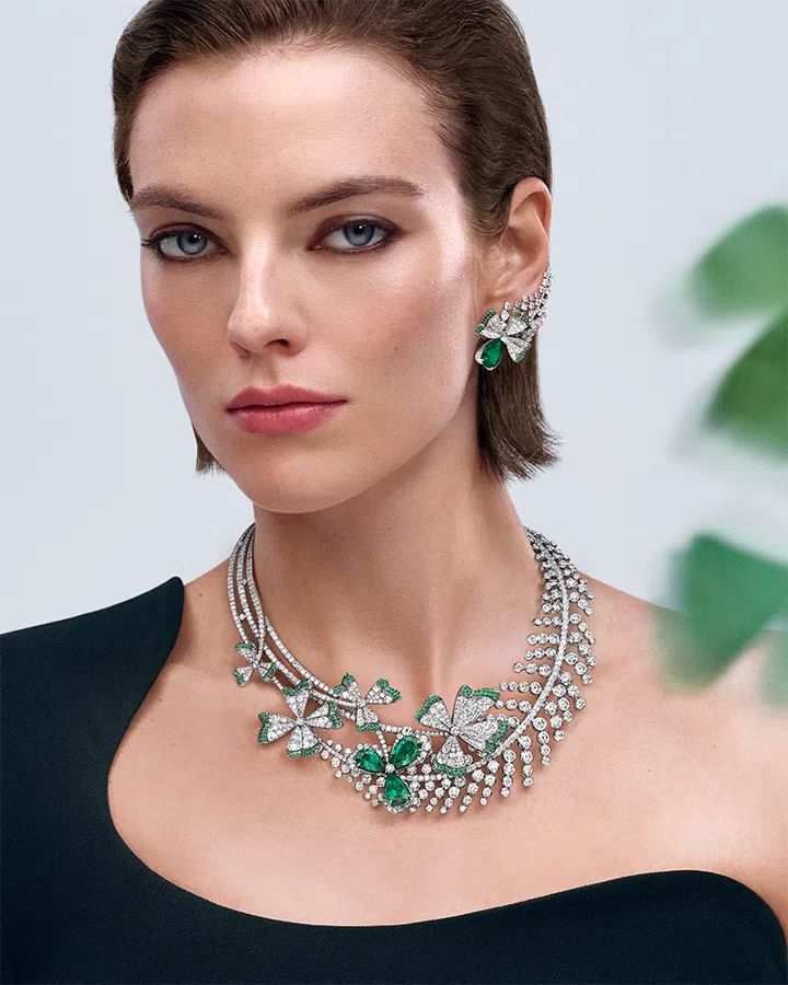 Models shows off Chaumet’s Jewels by Nature emerald clover jewellery