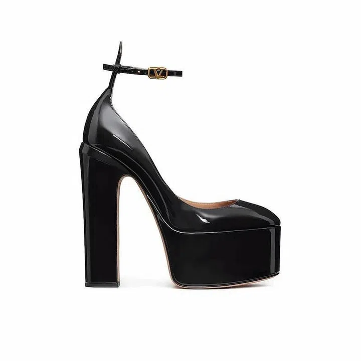 Tan-go Platform Pumps, $1,770, Valentino Garavani at Farfetch
