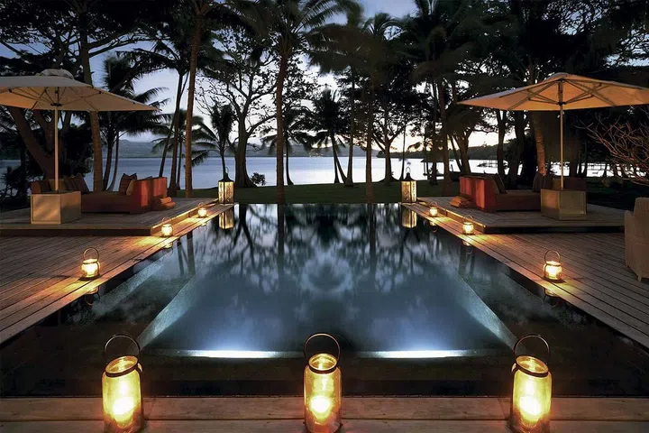 Channel Robinson Crusoe (minus the isolation and madness, of course) by inhabiting your own private island in Fiji. On Dolphin Island you'll be able to wake up to the sound of waves crashing on your beach, shower outdoors among your palm-trees and enjoy a refreshing dip in your infinity pool. The island features four wooden, thatched-roof homes in true tropical-cabin style, with views of the ocean and the mountains through the large bay windows.