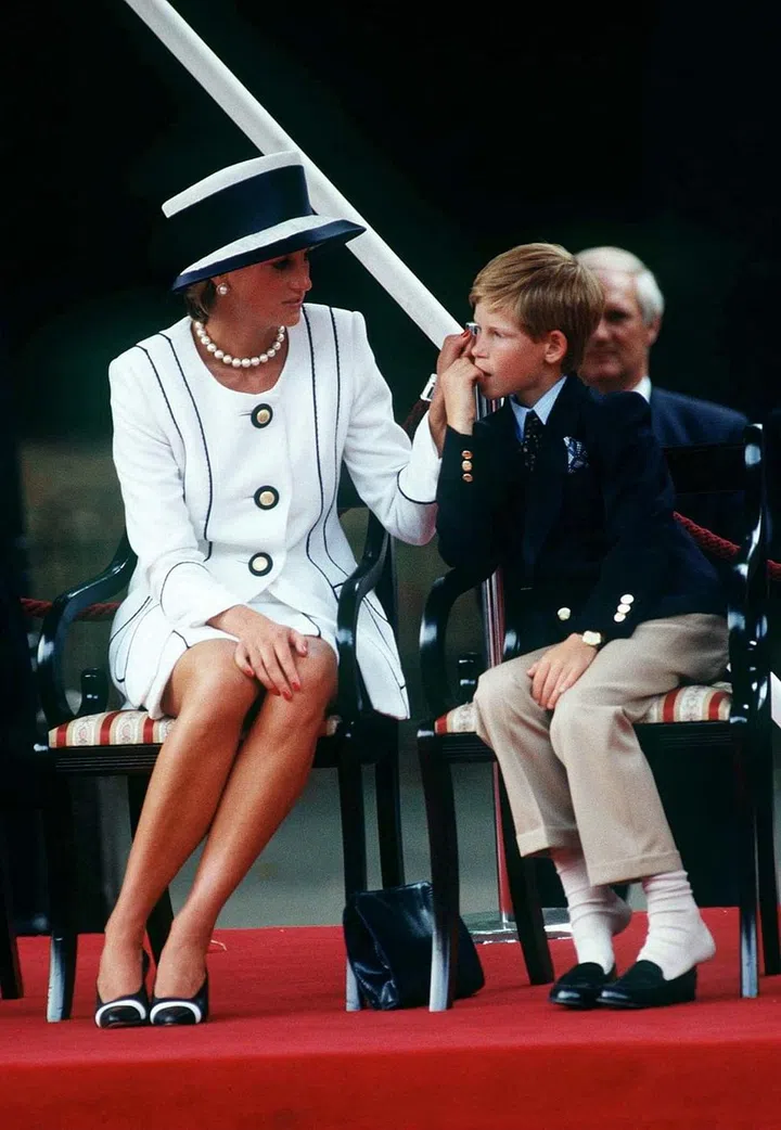 Princess Diana and Prince Harry during VJ day celebrations.