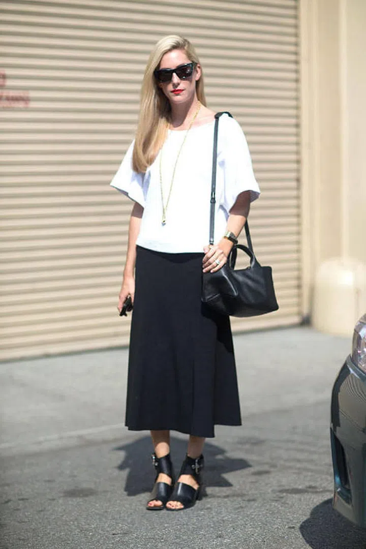 This '90s style is making a serious comeback—the stacked heel gives you a little height without sacrificing any comfort. Joanna Hillman in Celine sandals