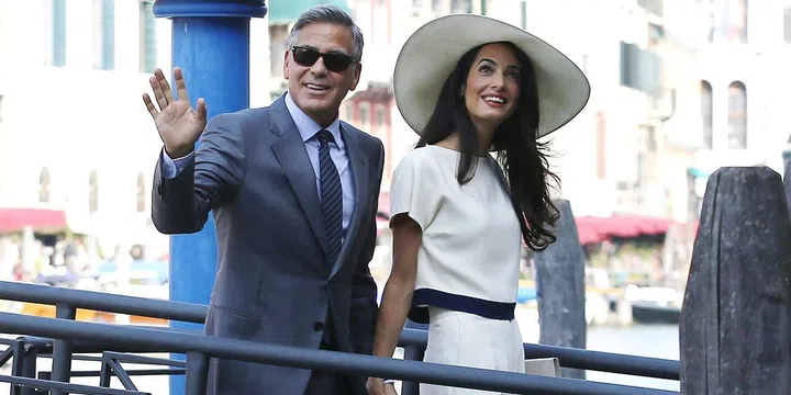 Arriving at the palazzo Ca Farsetti in Venice for the civil ceremony to officialise their marriage. Photo: Getty 