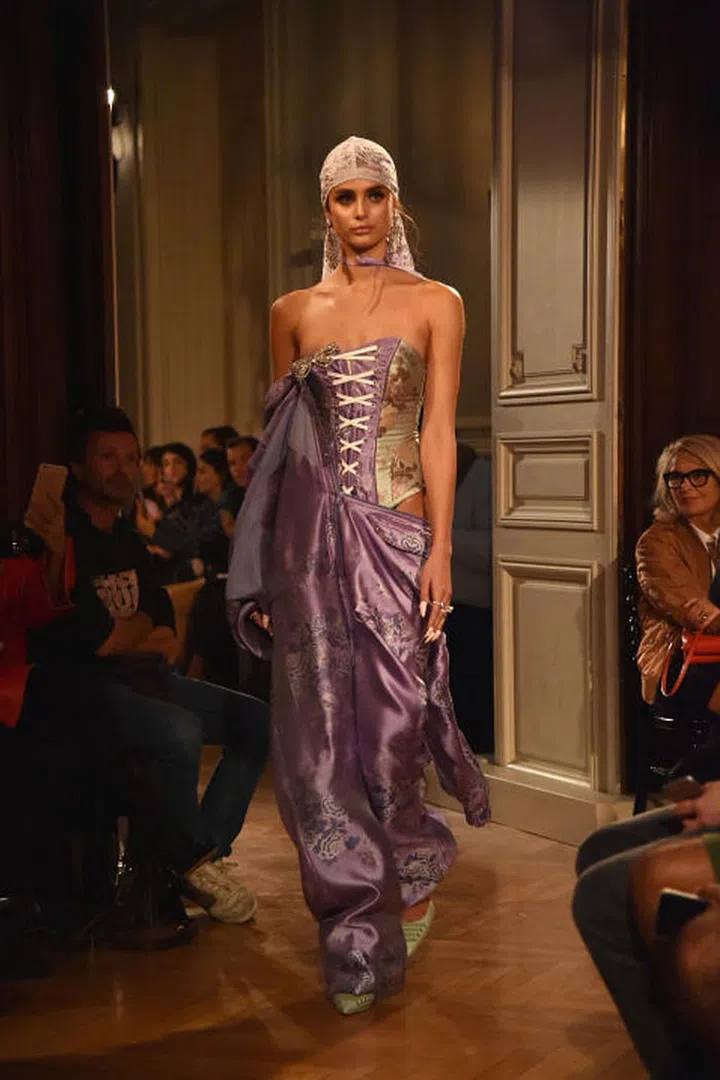 Emulate Rihanna's very bold collection for Fenty by Puma with a corset, a lace headscarf and plenty of silk.