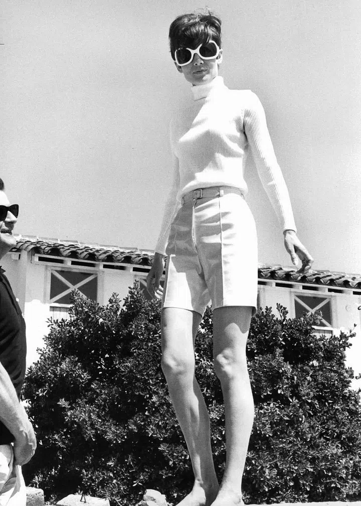 v
Polo neck? Check. Oversized sunglasses? Check. High-waist shorts? Check.