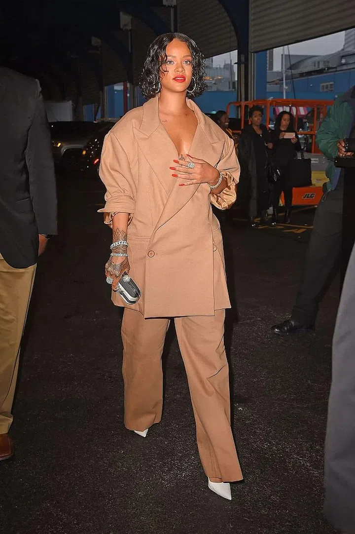 Getty
Business as Usual: Accentuate the power suit with contrasting accessories that pop. Photo: Getty 