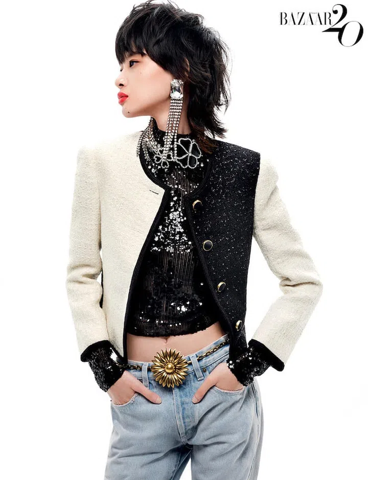 Jacket; top; jeans; earrings; necklace; belt, all by Saint Laurent. (Photo: Wee Khim)