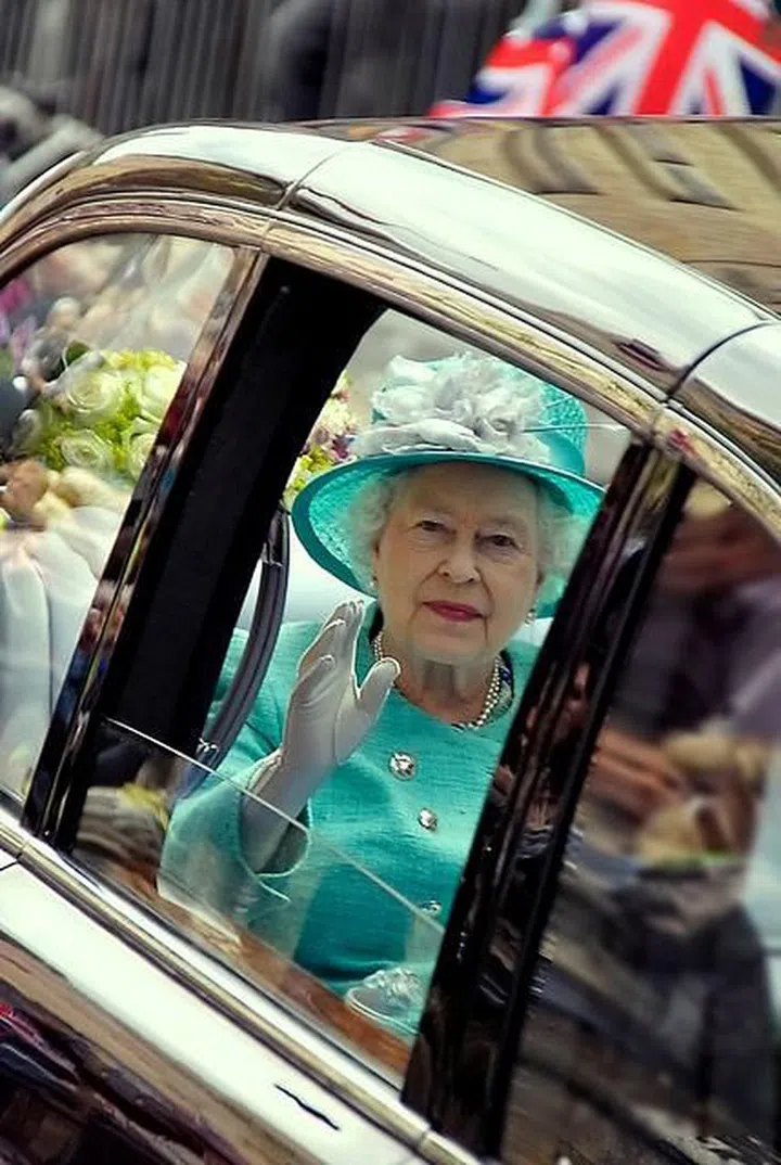 Being driven through Stamford in Lincolnshire in the Diamond Jubilee year.

Photo: Louis Waldon