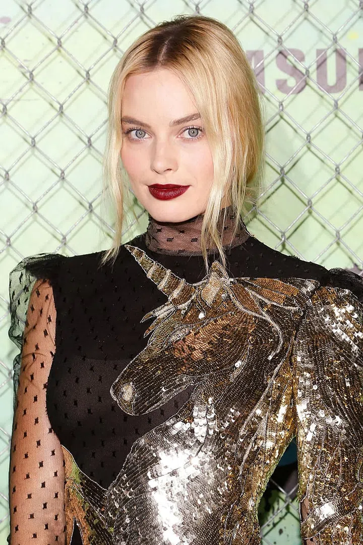 At a Suicide Squad premiere, Robbie wore this incredibly vampy wine hue.
