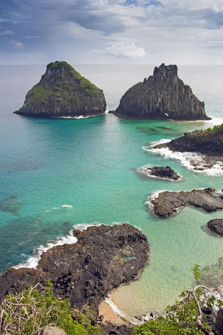 While the rest of the world descends upon Rio for the Olympics, head to this remote volcanic archipelago (located about 200 miles off Brazil's coast) that is famous for pristine white-sand beaches and crystal-clear waters filled with sea turtles and dolphins.