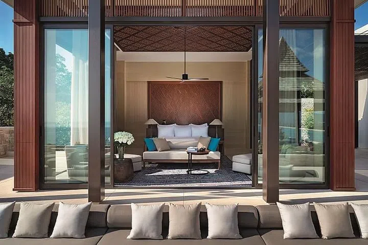 Looking into the living room from the vantage of your personal lap pool. Photo: Layan Residences by Anantara
