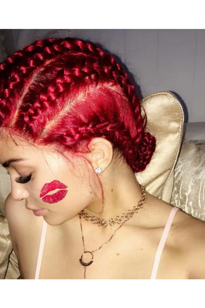 Kylie celebrated her 19th birthday with red braids that look so natural they have to be real, right? Wrong, this is yet another wig by Tokyo.