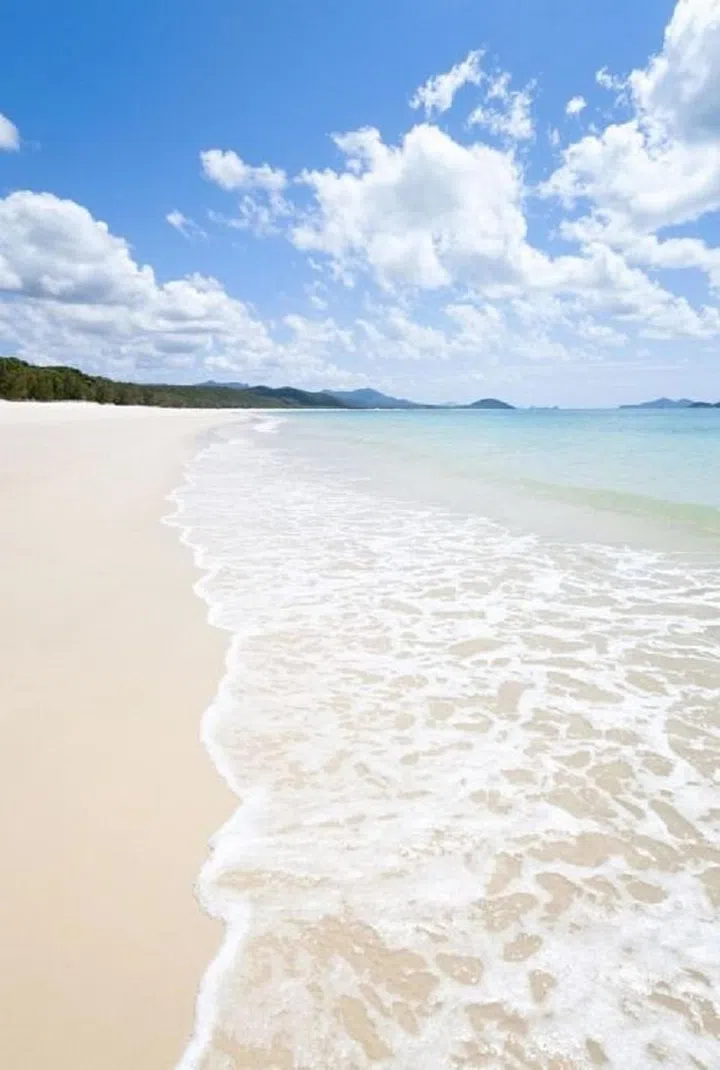 You have to take a tour boat to this island beach, but it's worth the trip: The sand is insanely white and considered to be some of teh purest in the world and the clear, turquoise water only makes it more stunning. Photo: Getty 