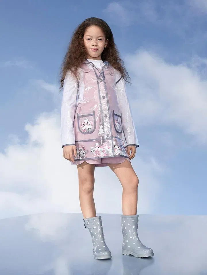 Girls' Clear Flower Raincoat, $40, Mauve Twill Scallop Romper, $20, White Poplin Button Down Shirt, $20. Photo: Target 