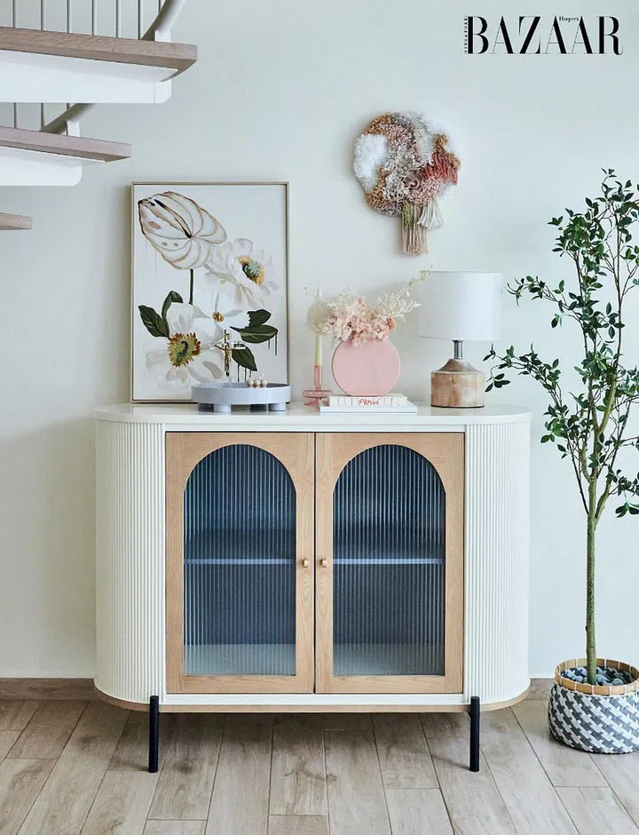 A gram-worthy nook located beneath the spiral stairs.