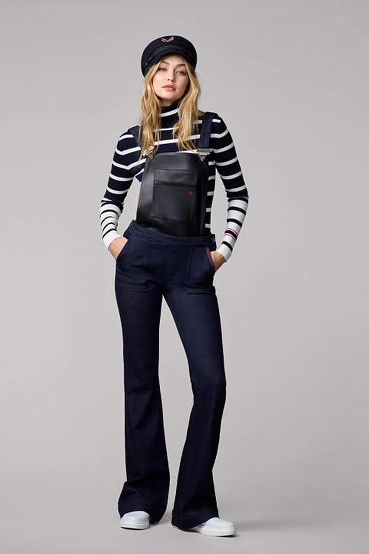 Nautical hat, skinny-rib roll-neck sweater, dungarees and slip-on sneakers