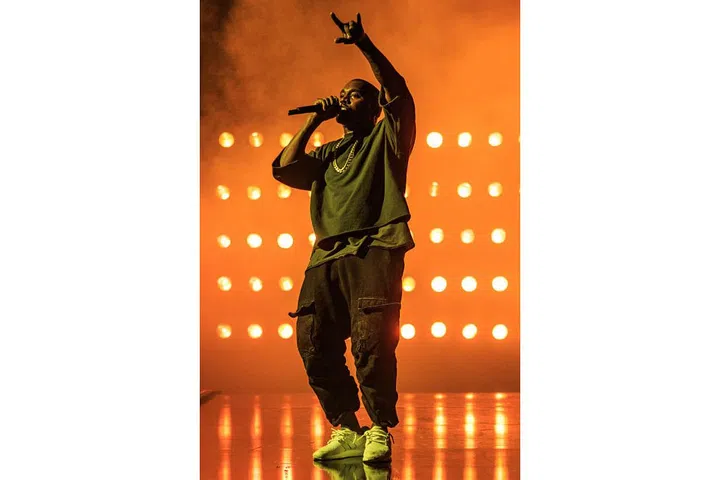 Before he was selling out tours, West folded clothes at the Gap. ; Photo: Getty