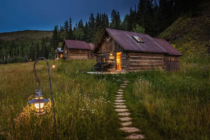 Just across from the mountains of Telluride, Dunton Hot Springs is set in a romantic ghost town free of cell phones. Explore nearby archaeological sites in the desert, go horseback riding in the high Rockies, or head to the hot springs at the resort.