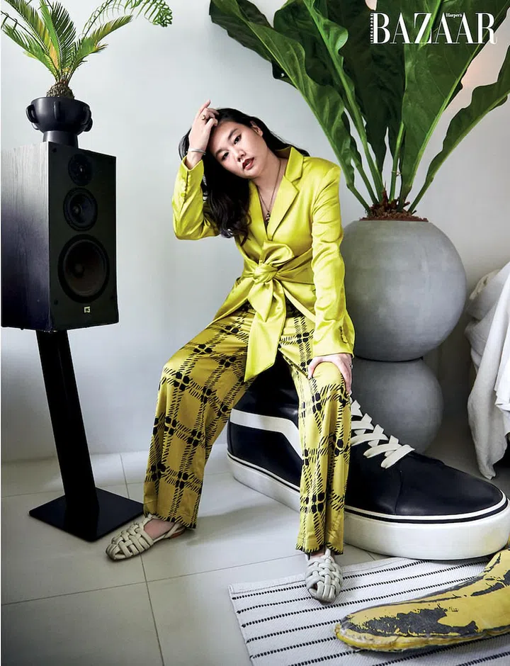 Tan in her own blazer and sandals with a Uniqlo x Marni trousers and Maison Margiela cuff. 